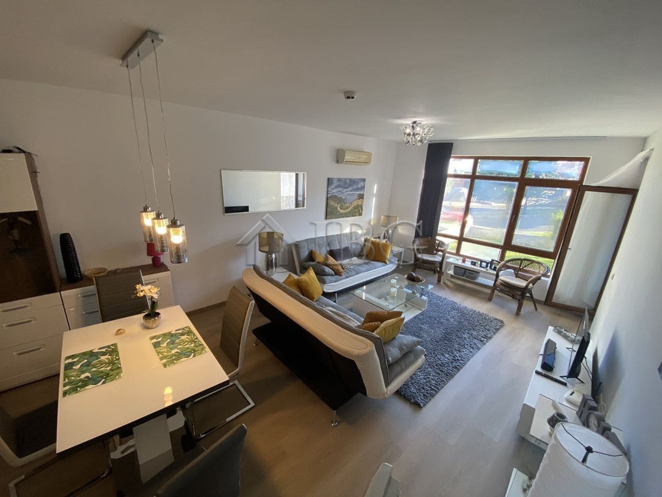 Modern apartment with private yard in Vineyards Resort, Aheloy. Bright living space, stylish furnitu.
