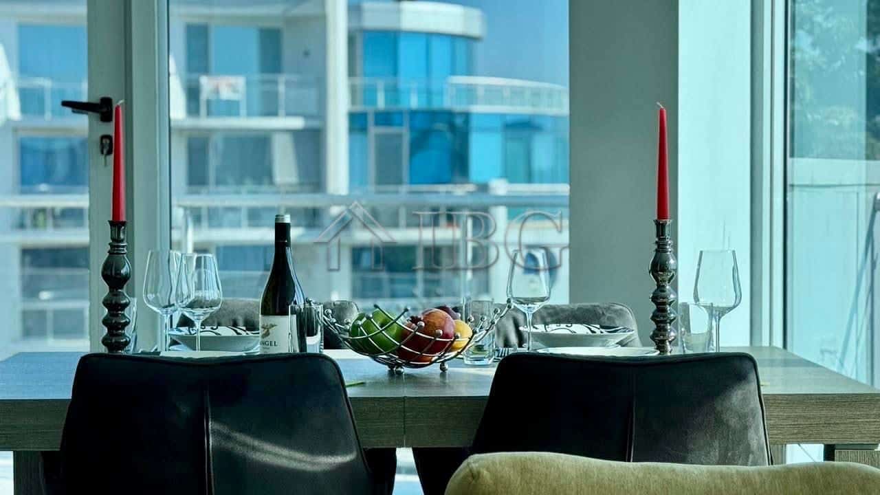 Elegant dining space with sea views, wine, and fruit in Atlantis Resort & Spa, Sarafovo.