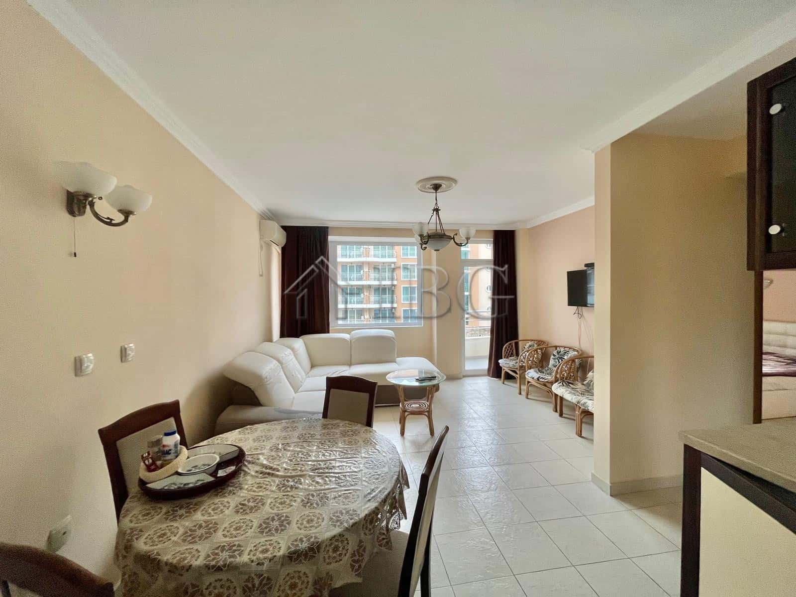 Apartment with pool view in Laguna 3, Sunny Beach, featuring modern furnishings and spacious living.