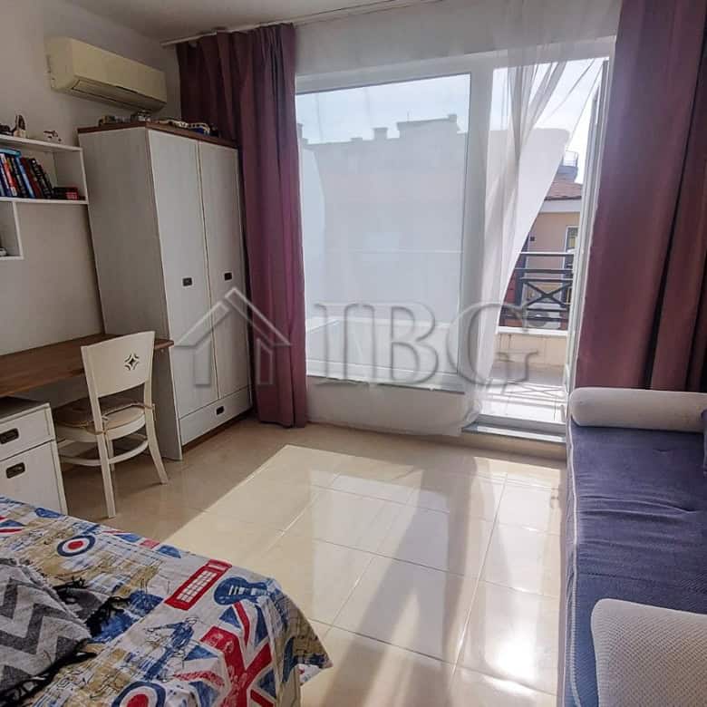 Bright 2-bedroom apartment with sea view, balcony, and modern furnishings in Pomorie.
