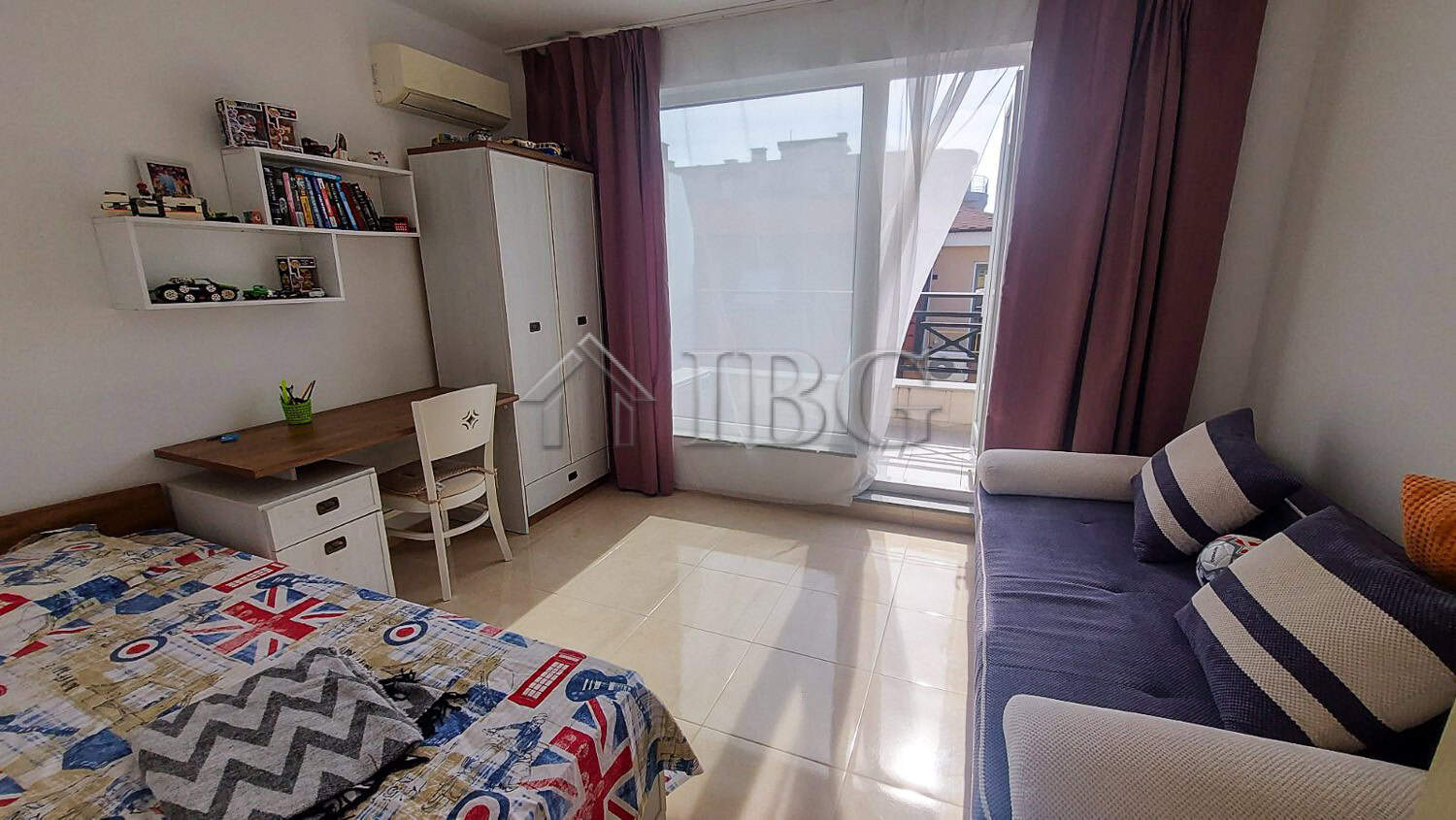 Bright 2-bedroom apartment with sea view, balcony, and modern furnishings in Pomorie.