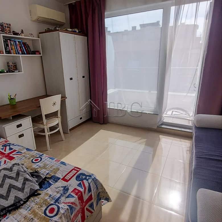 Bright 2-bedroom apartment with sea view, modern furnishings, and balcony in Pomorie.