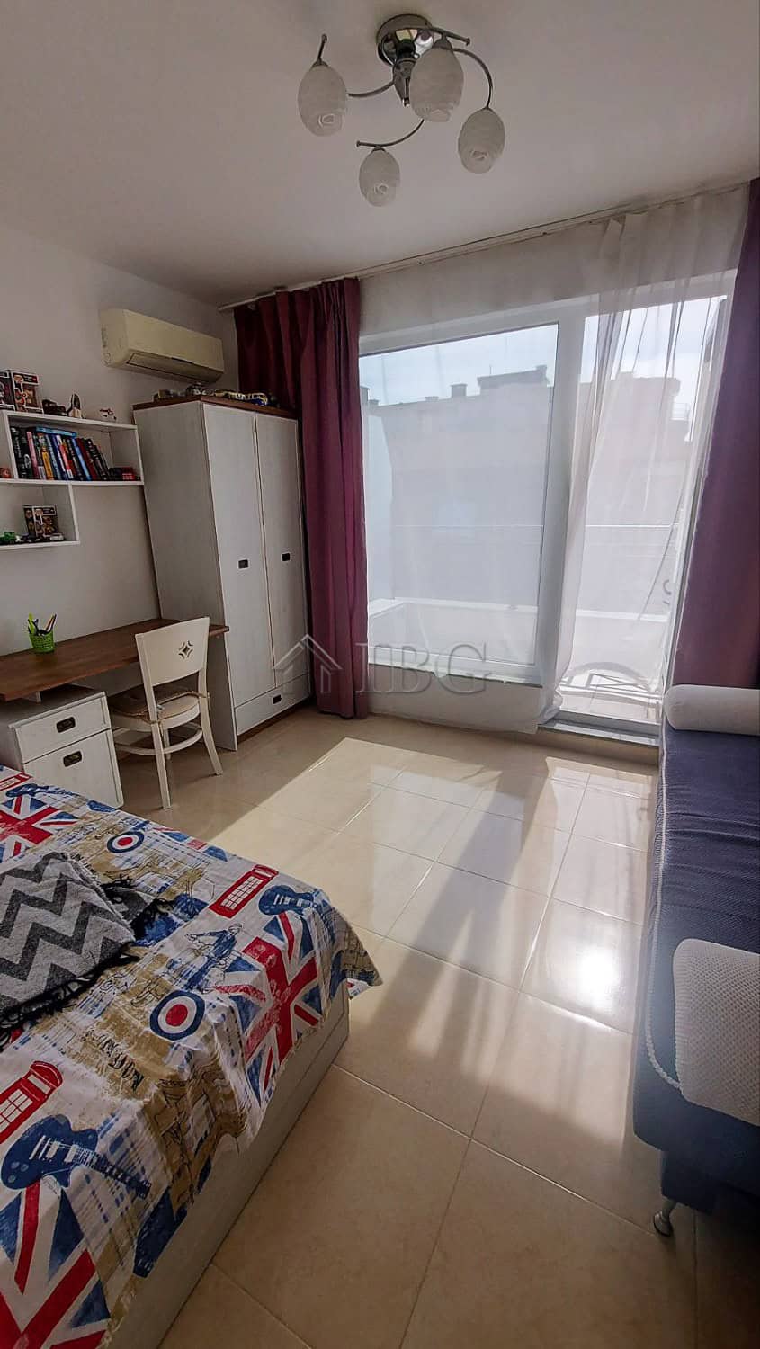 Bright 2-bedroom apartment with sea view, modern furnishings, and balcony in Pomorie.