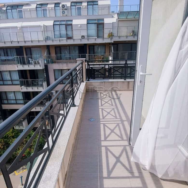 Balcony of a 2-bedroom apartment overlooking the sea in Pomorie, Bulgaria. Bright, modern outdoor sp.