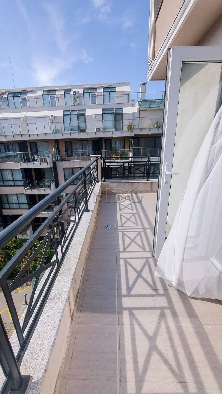 Balcony of a 2-bedroom apartment overlooking the sea in Pomorie, Bulgaria. Bright, modern outdoor sp.