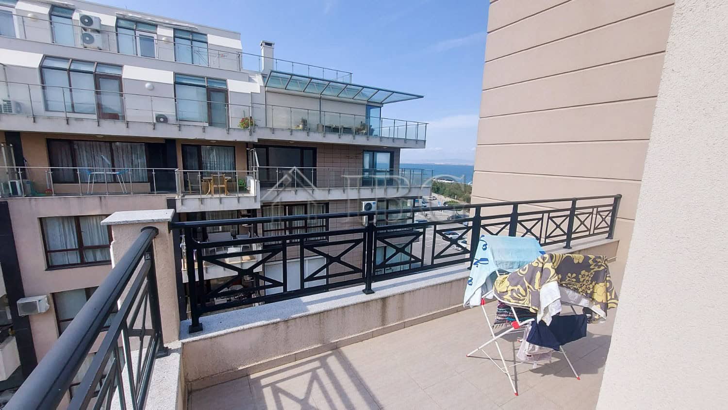 Bright 2-bedroom apartment overlooking the sea in Pomorie. Modern design with spacious balcony and s.