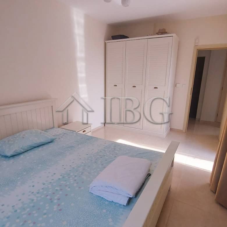 Sea view 2-bedroom apartment in Pomorie, Bulgaria, with modern furnishings and balcony overlooking t.