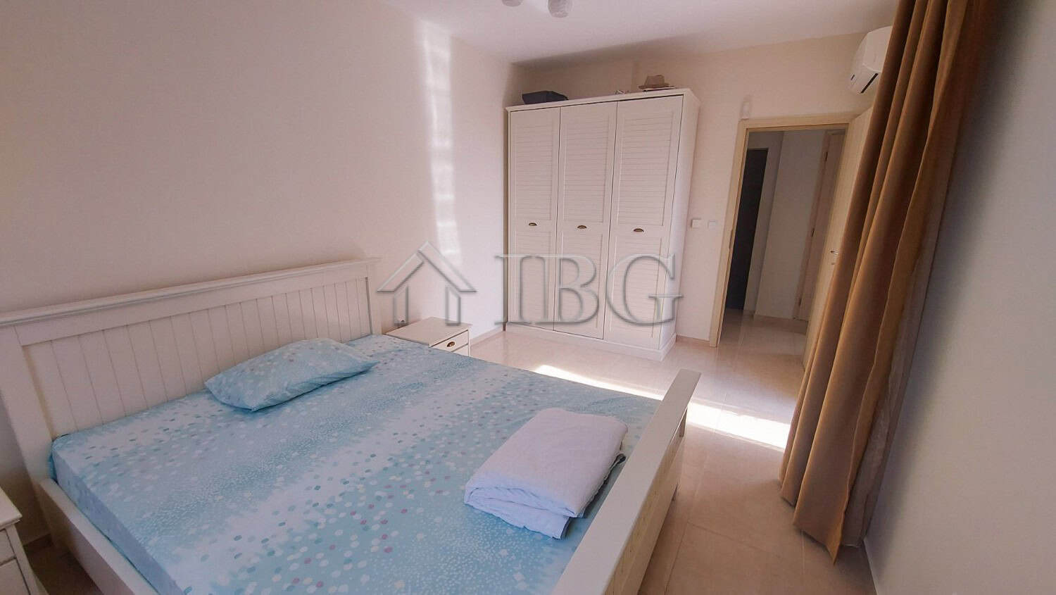 Sea view 2-bedroom apartment in Pomorie, Bulgaria, with modern furnishings and balcony overlooking t.