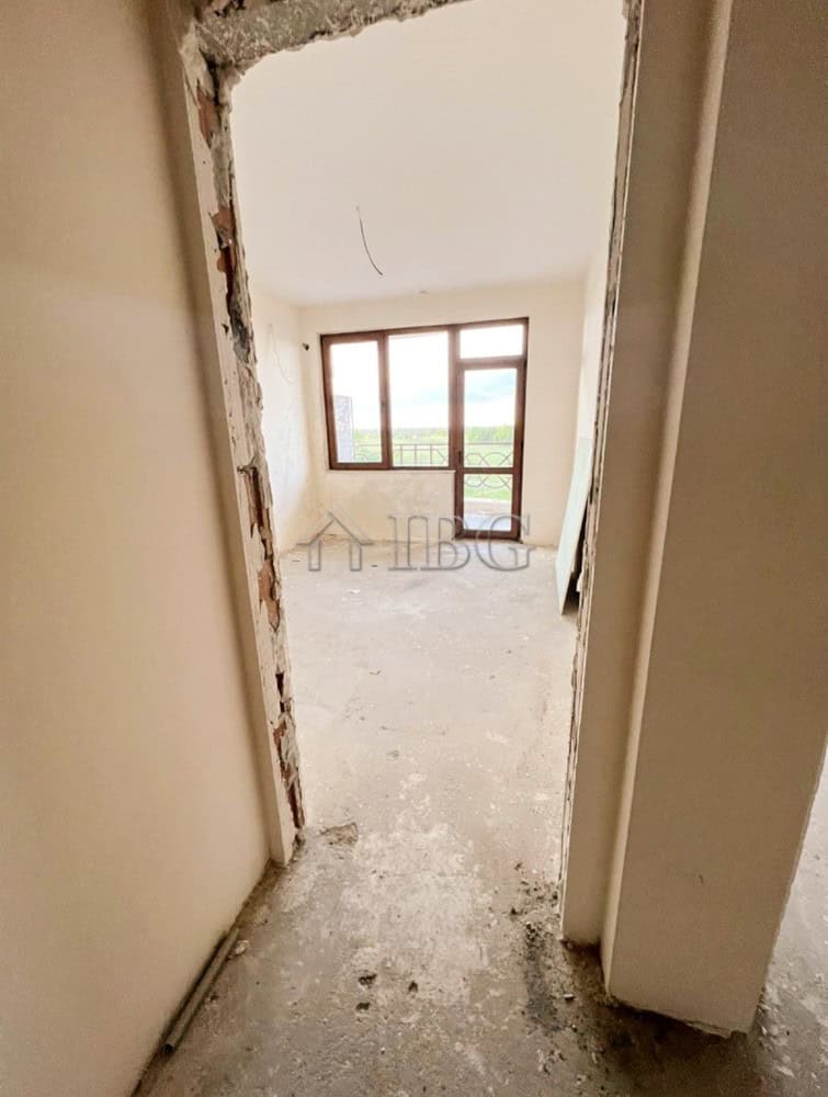 Bright one-bedroom apartment with large windows and scenic views at Lighthouse Golf Resort, Balchik.