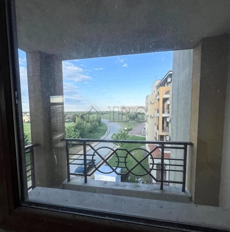 Balchik one-bedroom apartment with balcony overlooking lush greenery and a river, ideal for comforta.