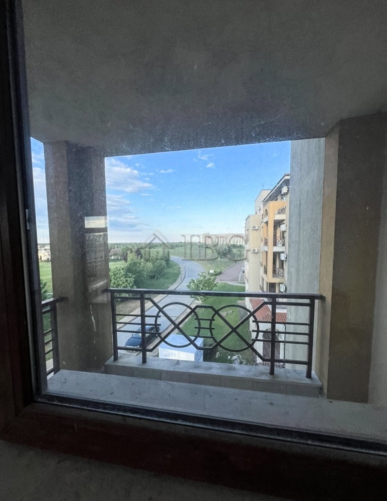Balchik one-bedroom apartment with balcony overlooking lush greenery and a river, ideal for comforta.