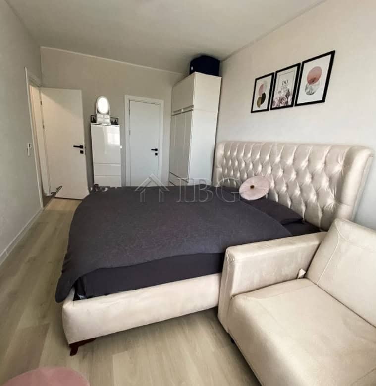 Modern 2-bedroom apartment with pool view at Lighthouse Golf & Spa Resort, featuring stylish decor a.