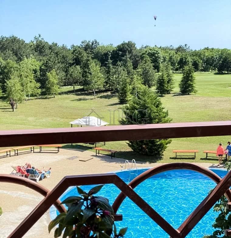 Beautiful pool view from a spacious 2-bedroom apartment at Lighthouse Golf & Spa Resort. Perfect for.