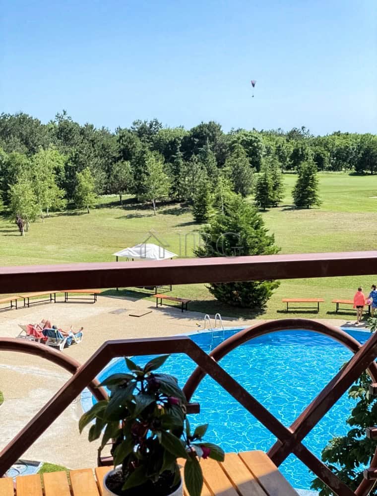 Beautiful pool view from a spacious 2-bedroom apartment at Lighthouse Golf & Spa Resort. Perfect for.