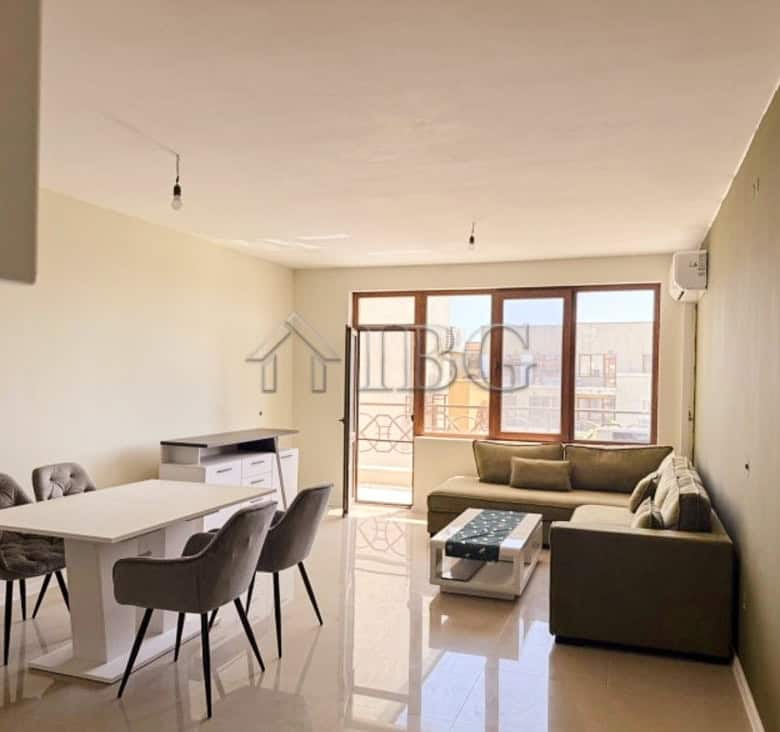 Modern 2-bedroom apartment with large windows offering scenic golf course views. Perfect for comfort.
