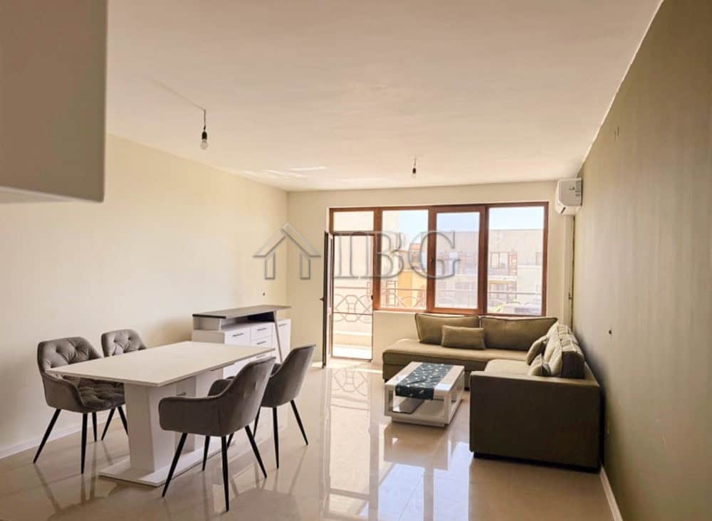 Modern 2-bedroom apartment with large windows offering scenic golf course views. Perfect for comfort.