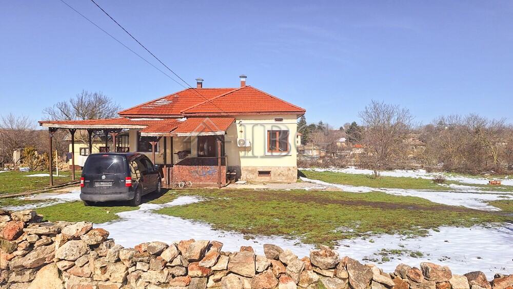 Renovated house with large garden and outbuildings near a quiet area, ideal for peaceful living.