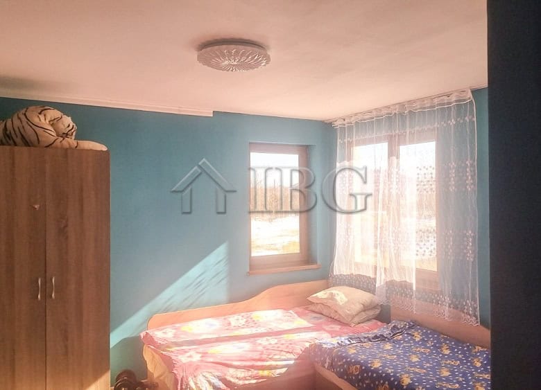 Interior of renovated house with large garden and outbuildings near the quiet area center.