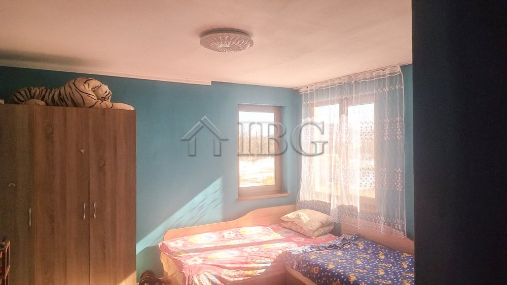 Interior of renovated house with large garden and outbuildings near the quiet area center.