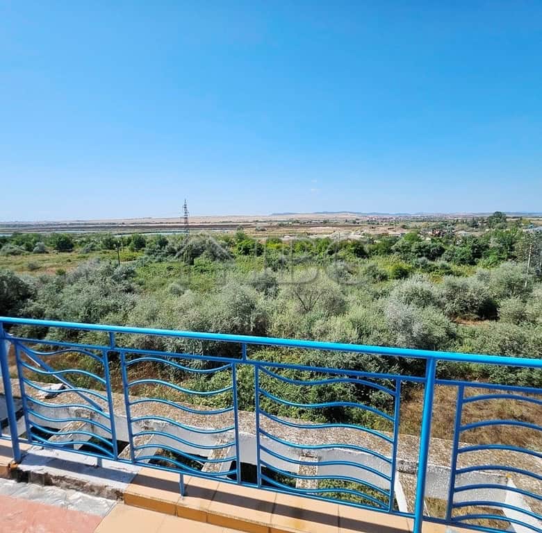 Balcony overlooking lush greenery and open landscape at Sunny Day 3 Complex, Sunny Beach.