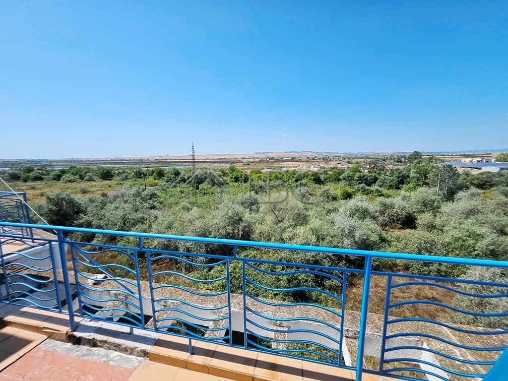Balcony overlooking lush greenery and open landscape at Sunny Day 3 Complex, Sunny Beach.