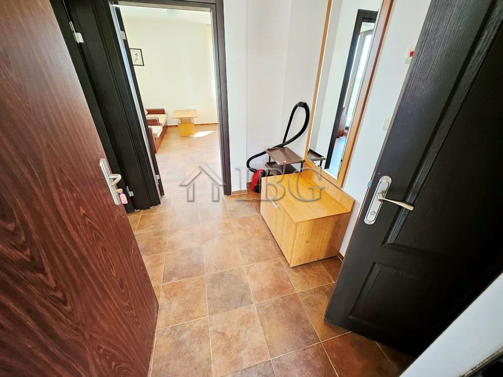Bright 1-bedroom apartment entrance in Bay View Villas, Sunny Beach. Modern decor and cozy atmospher.