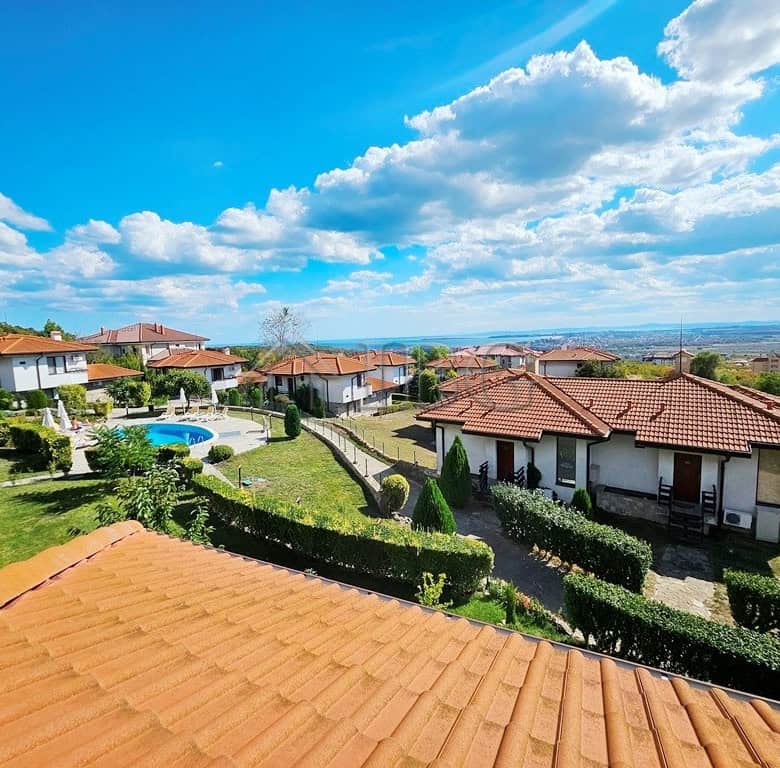 Beautiful view of Bay View Villas with lush gardens and swimming pools in Sunny Beach, Bulgaria.