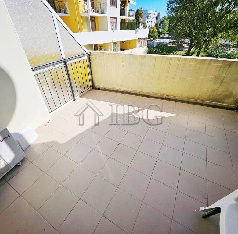Balcony overlooking the pool area of a 1-bedroom apartment in Blue Summer Complex, Sunny Beach.