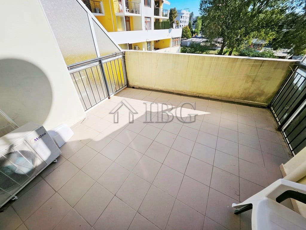 Spacious balcony with pool view in Sunny Beach apartment Balcony overlooking the pool area of a 1-bedroom apartment in Blue Summer Complex, Sunny Beach.