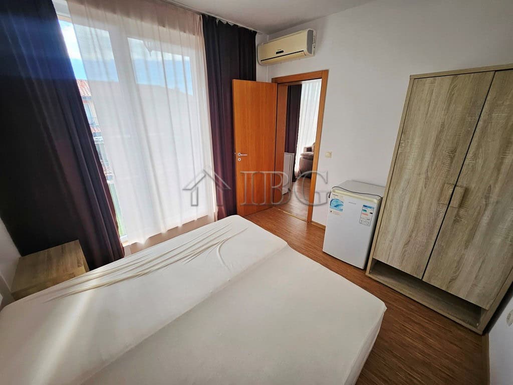 Spacious bedroom featuring a large window, wardrobe, and air conditioning in Sunny View Central, Sun.