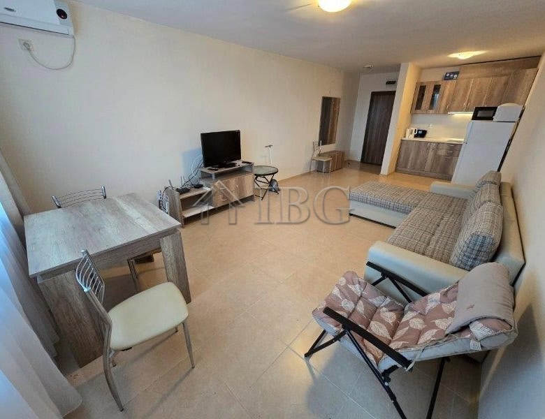 Sea View 1-bedroom apartment in LifeStyle 3, Ravda with modern furnishings and open-plan living area.