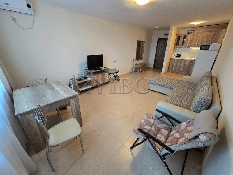 Sea View 1-bedroom apartment in LifeStyle 3, Ravda with modern furnishings and open-plan living area.