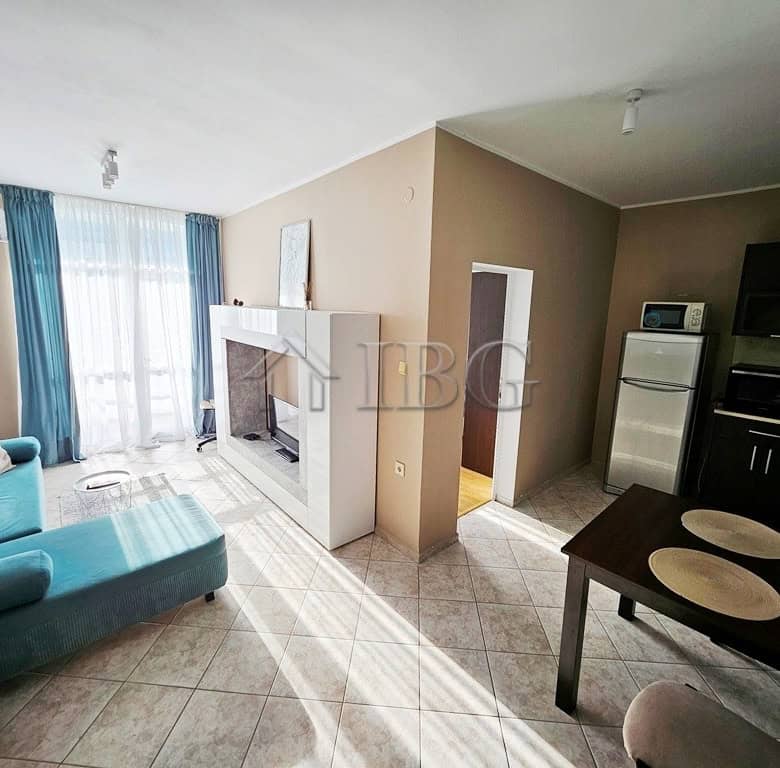 Bright 2-room apartment with living area, kitchen, and balcony in Pirop City, Sunny Beach. Perfect h.