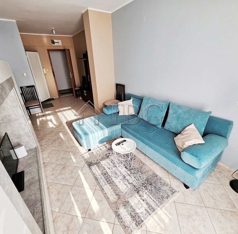 Bright living room with modern furniture and natural light in Pirop City, Sunny Beach.