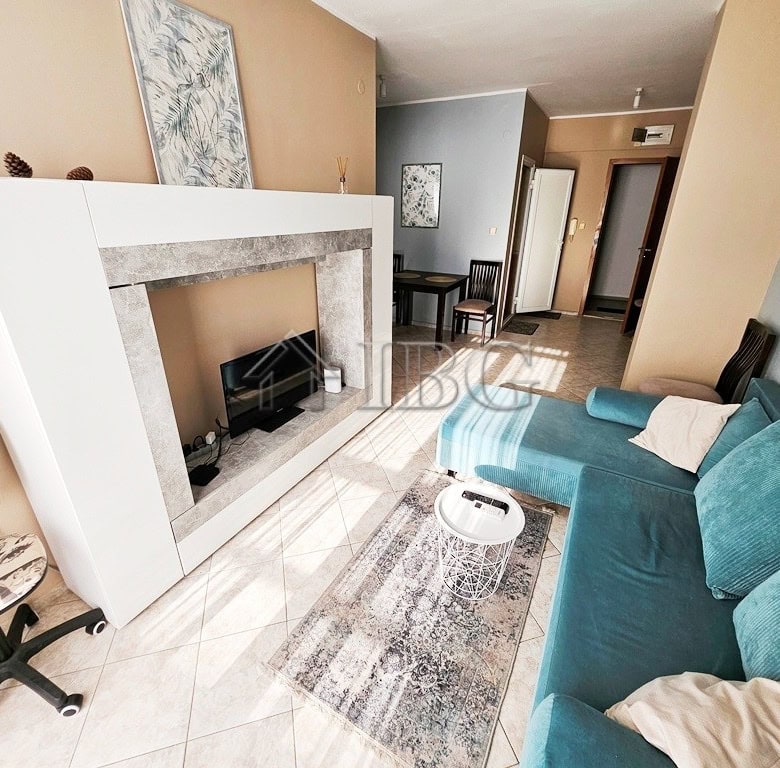 Bright living room with contemporary decor and a cozy sofa.