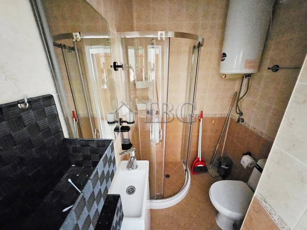 Cozy 2-Room Apartment in Sunny Beach Compact bathroom with shower cabin and modern fixtures in Pirop City, Sunny Beach.