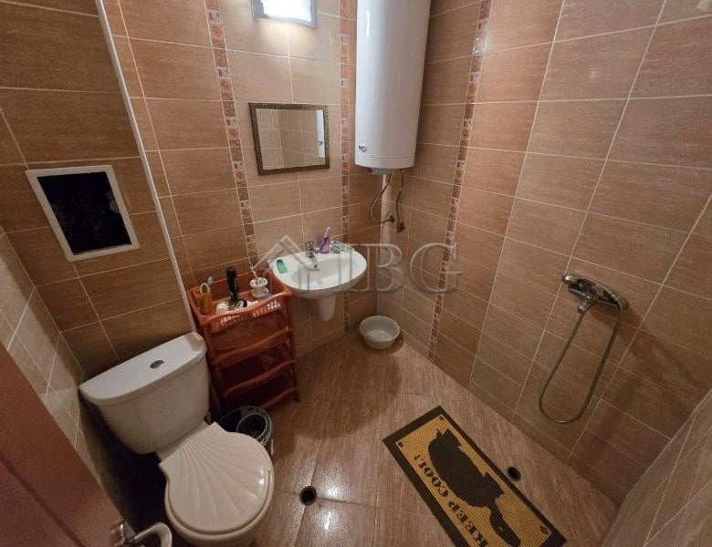 Bathroom with shower, toilet, and water heater in Elitonia 2, Ravda.