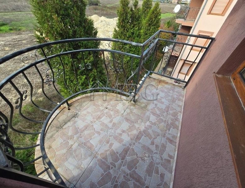 Balcony of a 1-bedroom apartment in Elitonia 2, Ravda with decorative iron railing and scenic views.