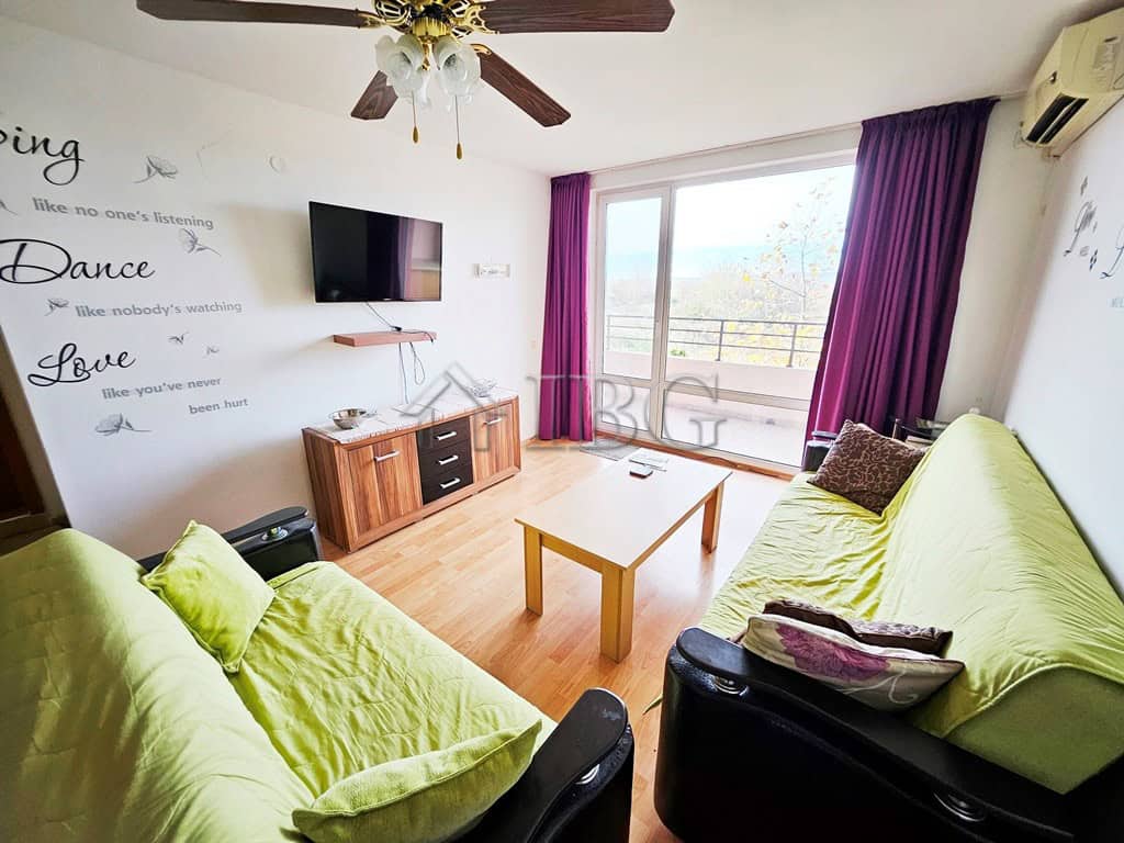 Bright living room with large balcony and scenic views in Sunny Beach.