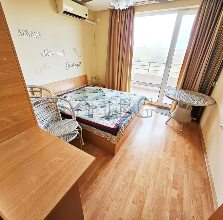 Spacious 2-bedroom apartment with balcony, bright living space, and scenic views at Holiday Fort Gol.