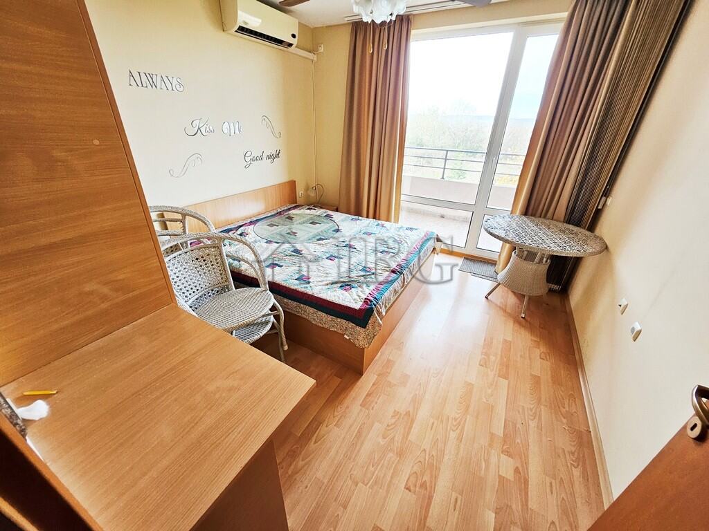 Spacious 2-bedroom apartment with balcony, bright living space, and scenic views at Holiday Fort Gol.