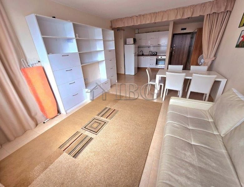 One-bedroom apartment with pool view in LifeStyle 3, Ravda. Modern interior, open-plan living area,.