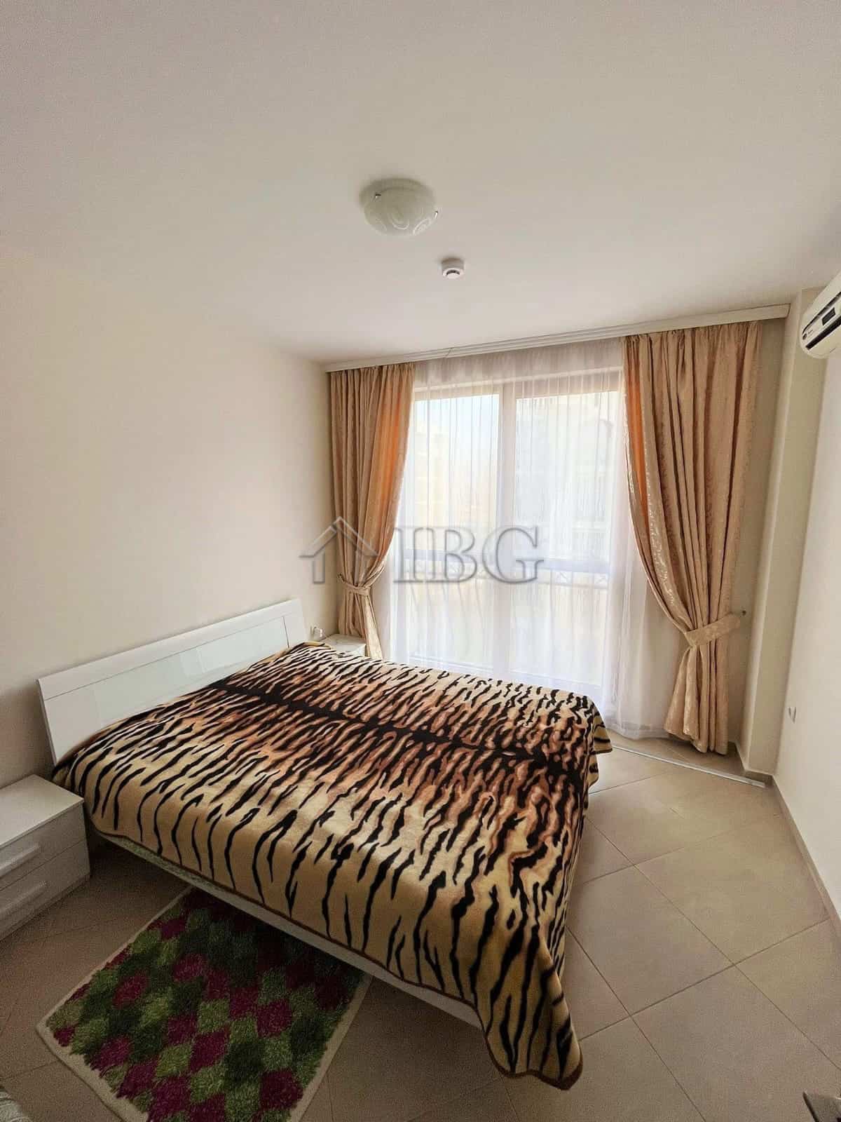 Furnished 1-bedroom apartment with tiger print bedding at Cascadas Family Resort, Sunny Beach.