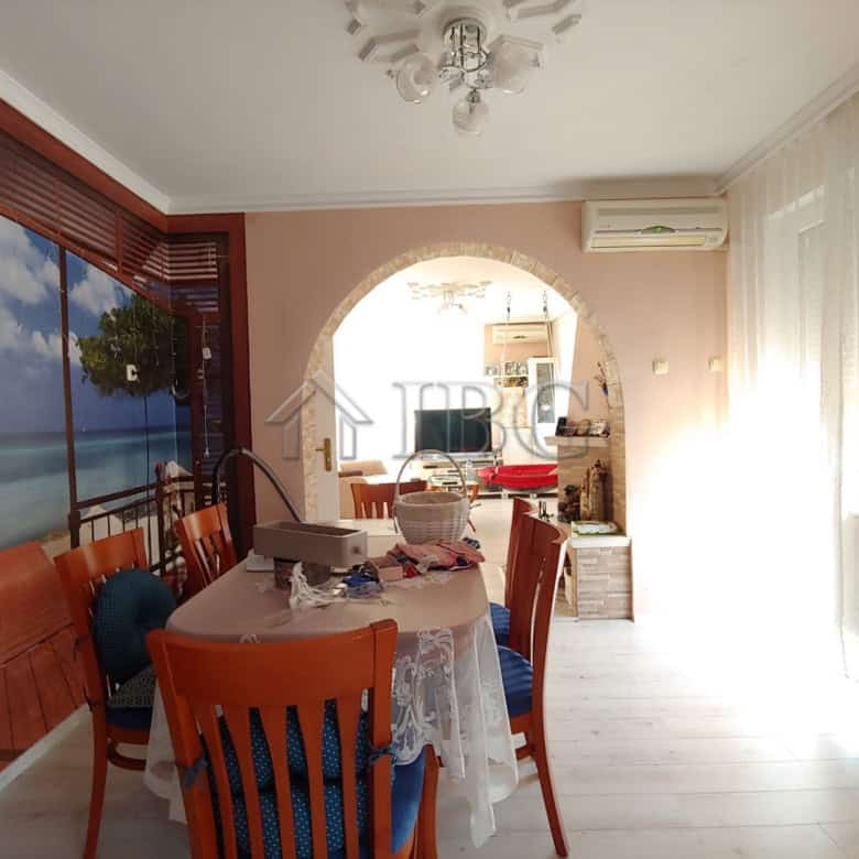 Interior view of a spacious 6-bedroom house in Kosharitsa near the sea, with bright living space and.