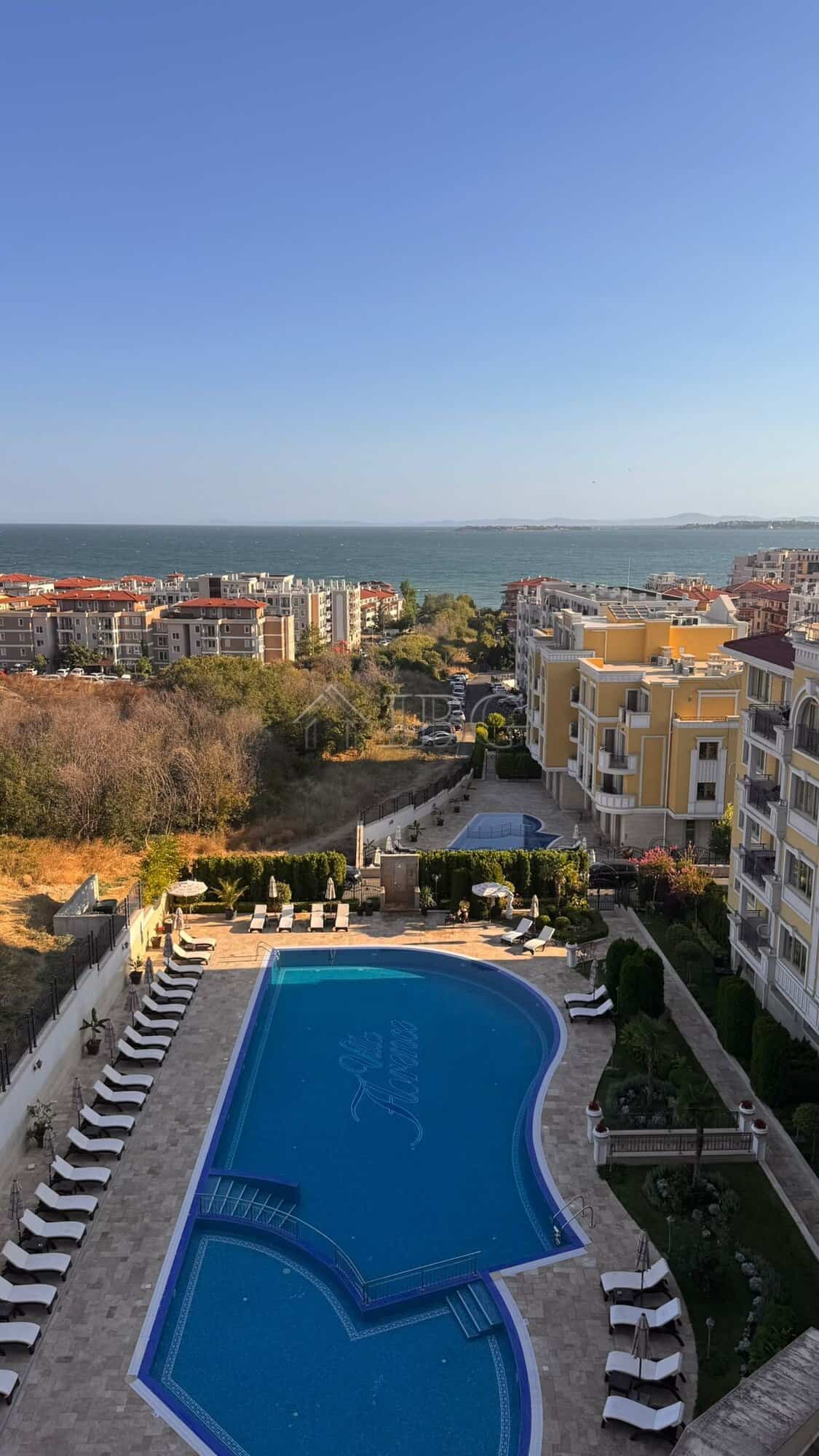 Apartment with stunning sea and mountain views in Sveti Vlas. Modern two-bedroom property with a poo.