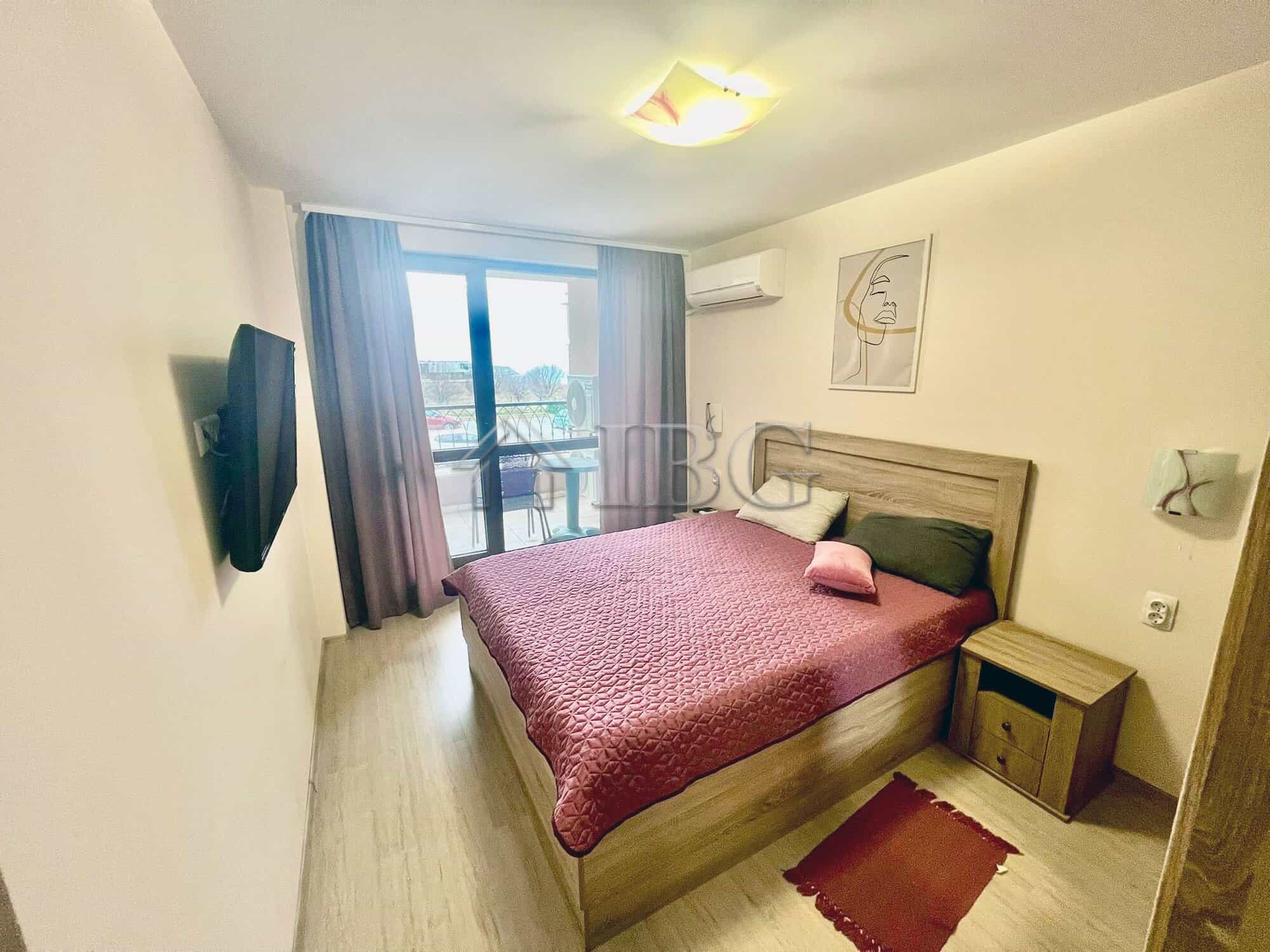 Spacious bedroom with sea view balcony in Burgas Beach Resort 2, Sarafovo. Modern furnishings and br.