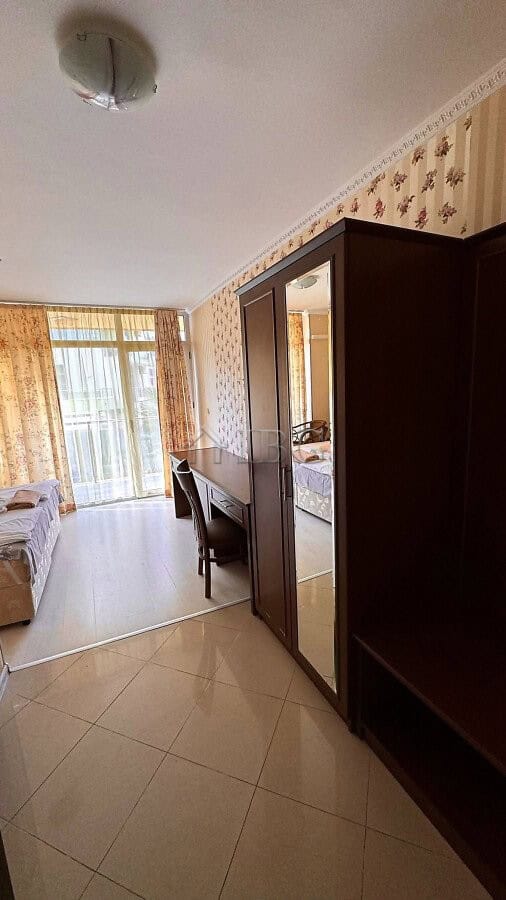 Interior view of a 2-bedroom apartment with pool and partial sea view in Sunny Beach.