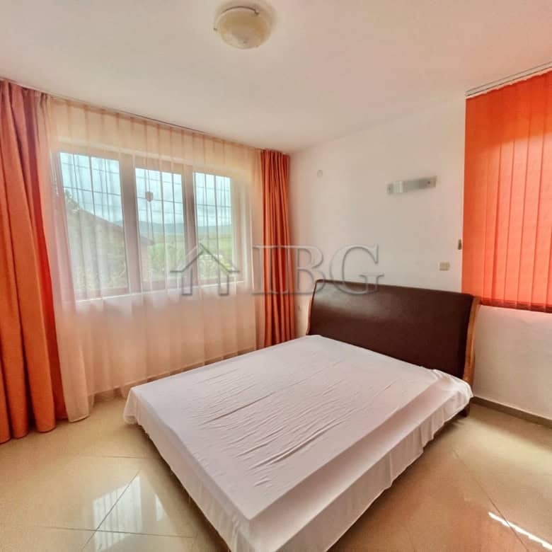 Bright bedroom with large windows and natural light in Aleksandrovo, Burgas.