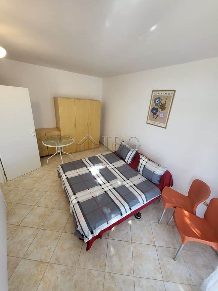 Comfortable bedroom with garden view and access in Sunset Kosharitsa.