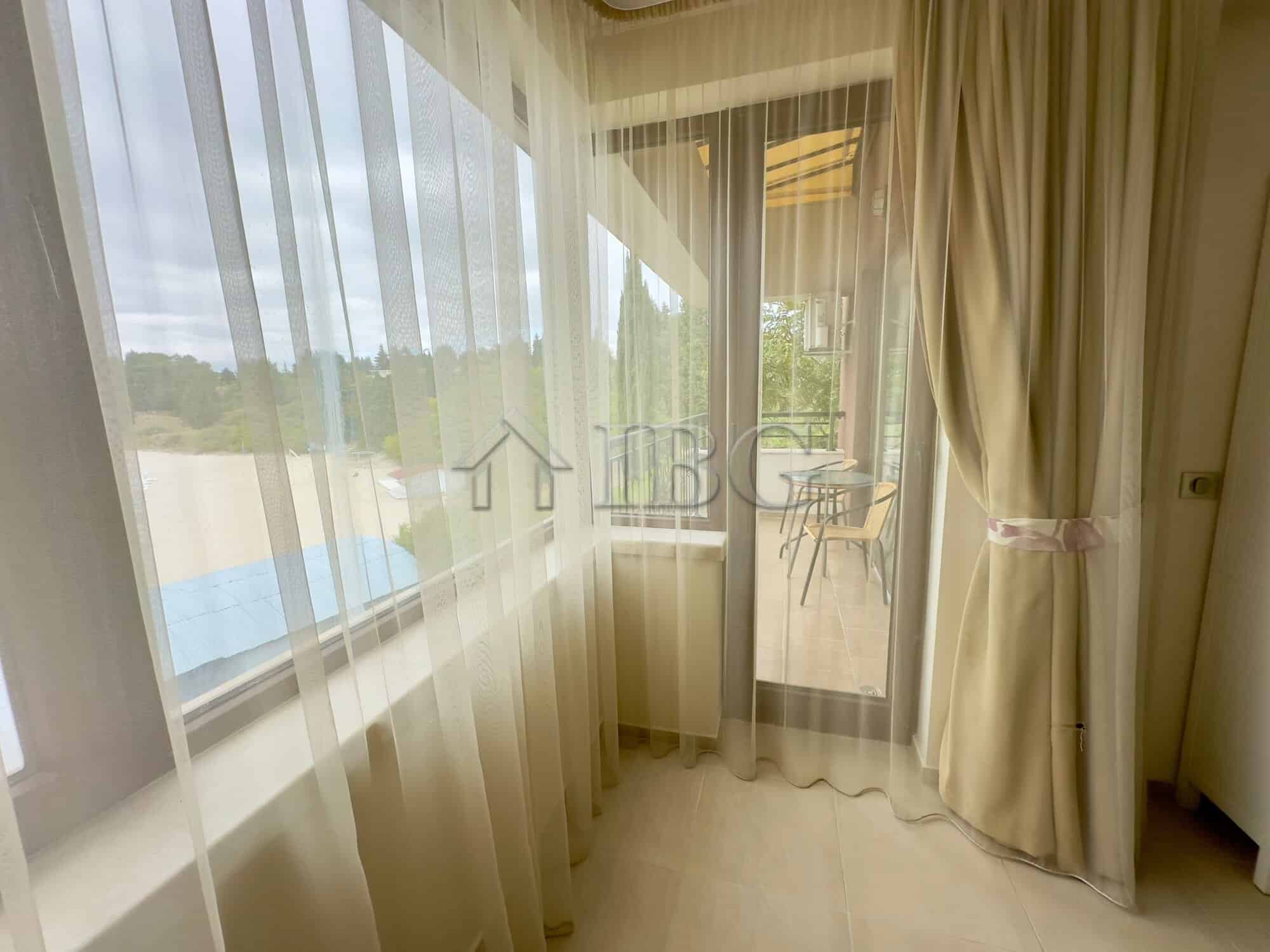 Bright balcony overlooking the sea and beach in Nessebar, Bulgaria. Perfect for relaxing and enjoyin.